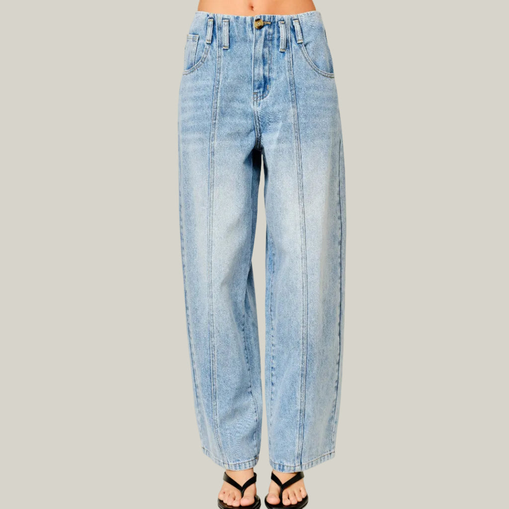 Light blue jeans on a plain background