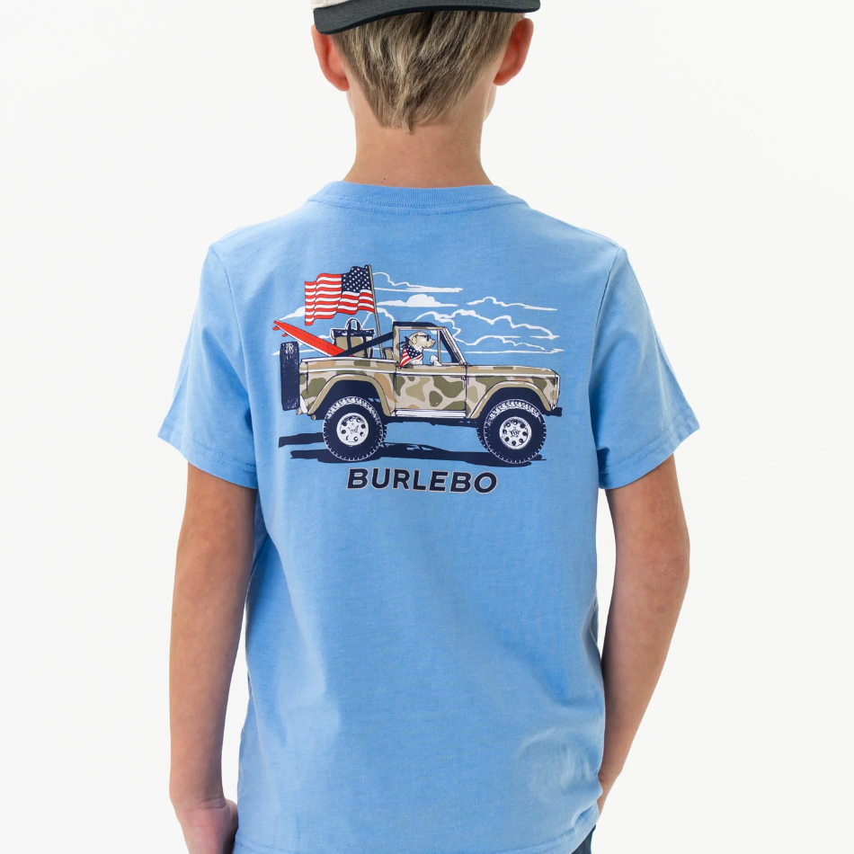 Child wearing a blue t-shirt with a graphic design and 'Burlebo' branding on a white background