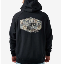 Man wearing a black sweatshirt with the words Iron Sharpens Iron