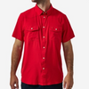 Man wearing a red shirt with pearl snap buttons