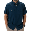Man wearing a navy blue short-sleeve shirt with button details on a white background