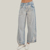 Light blue jeans worn by a person on a neutral background
