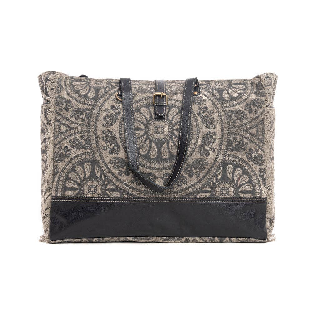 Patterned tote bag with black accents on a white background