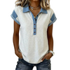 Woman wearing a white and blue short-sleeve shirt with a plain background