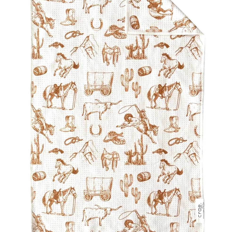Patterned paper with cowboy-themed illustrations on a white background