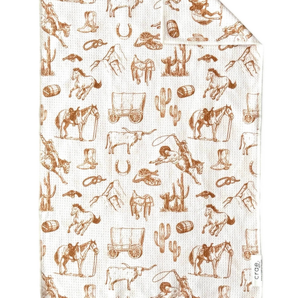 Patterned paper with cowboy-themed illustrations on a white background