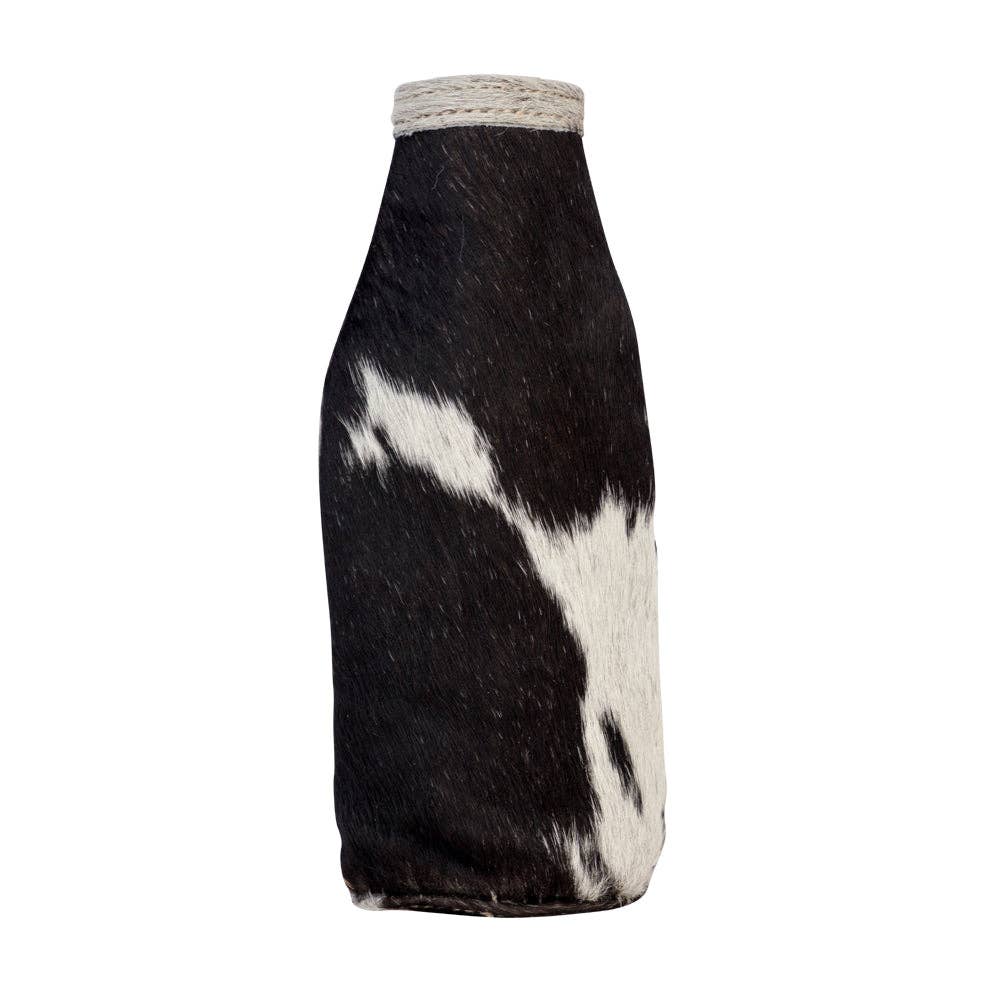 Black and white cowhide bottle cover on a white background