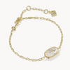 Gold bracelet with clear gemstones on a white background