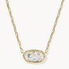 Gold necklace with a clear gemstone pendant on a white background