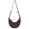 Purple shoulder bag with a strap on a white background