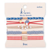 Set of hair ties and bracelets on a 'klani' branded card with various designs including stars, hearts, and American flag.