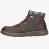 Brown leather boot with plaid lining on a white background