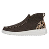 Brown slip-on shoe with leopard print accent on a white background