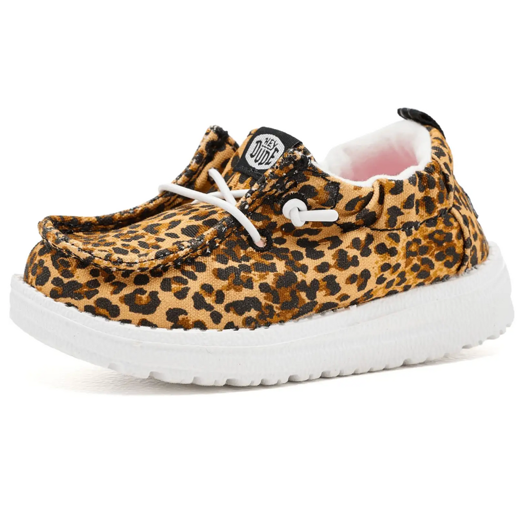 Leopard print sneaker with white sole on a white background