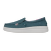 Blue slip-on shoe with white sole on a white background