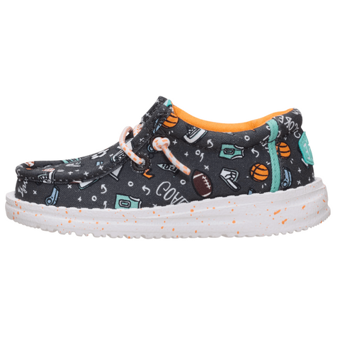 Children's shoe with patterned design on a white background