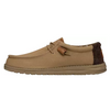 Beige casual shoe with brown accents on a white background
