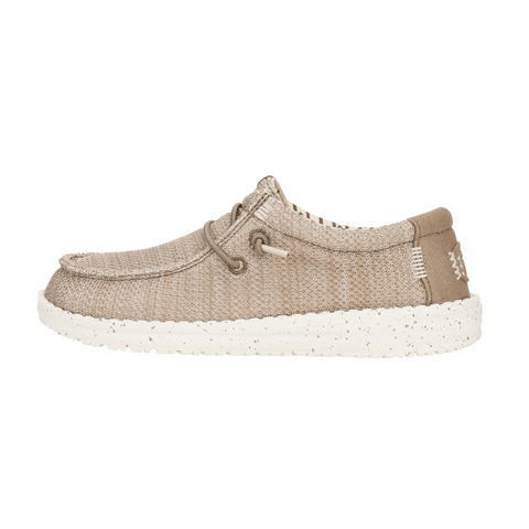 Beige casual shoe with white sole on a white background