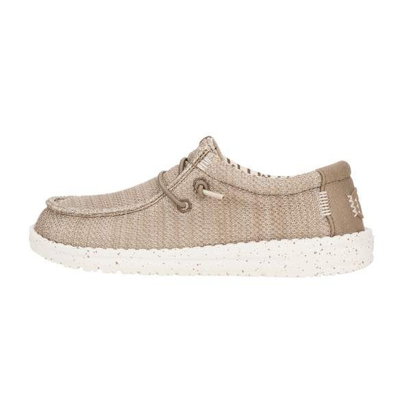 Beige casual shoe with white sole on a white background