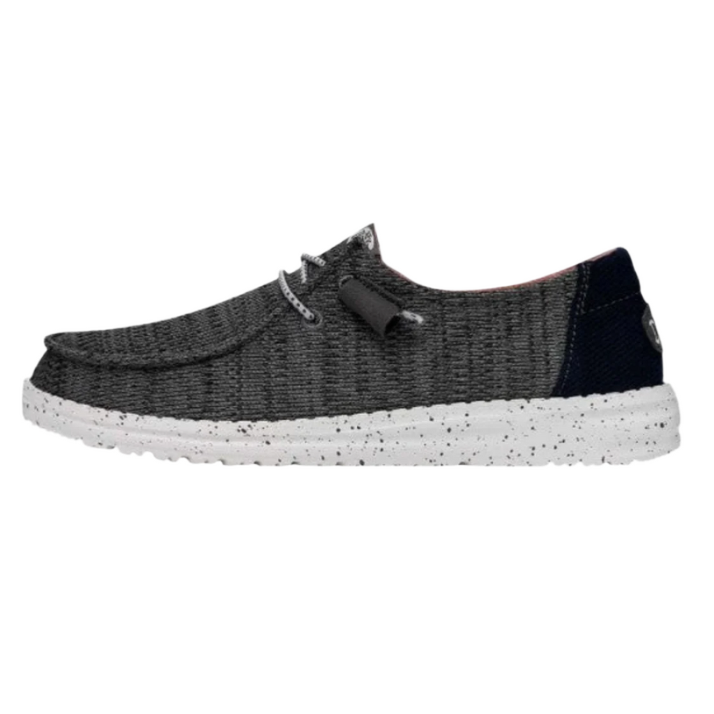 Black and gray sneaker with white sole on a white background