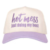 Cap with 'hot mess just doing my best' text on a white background