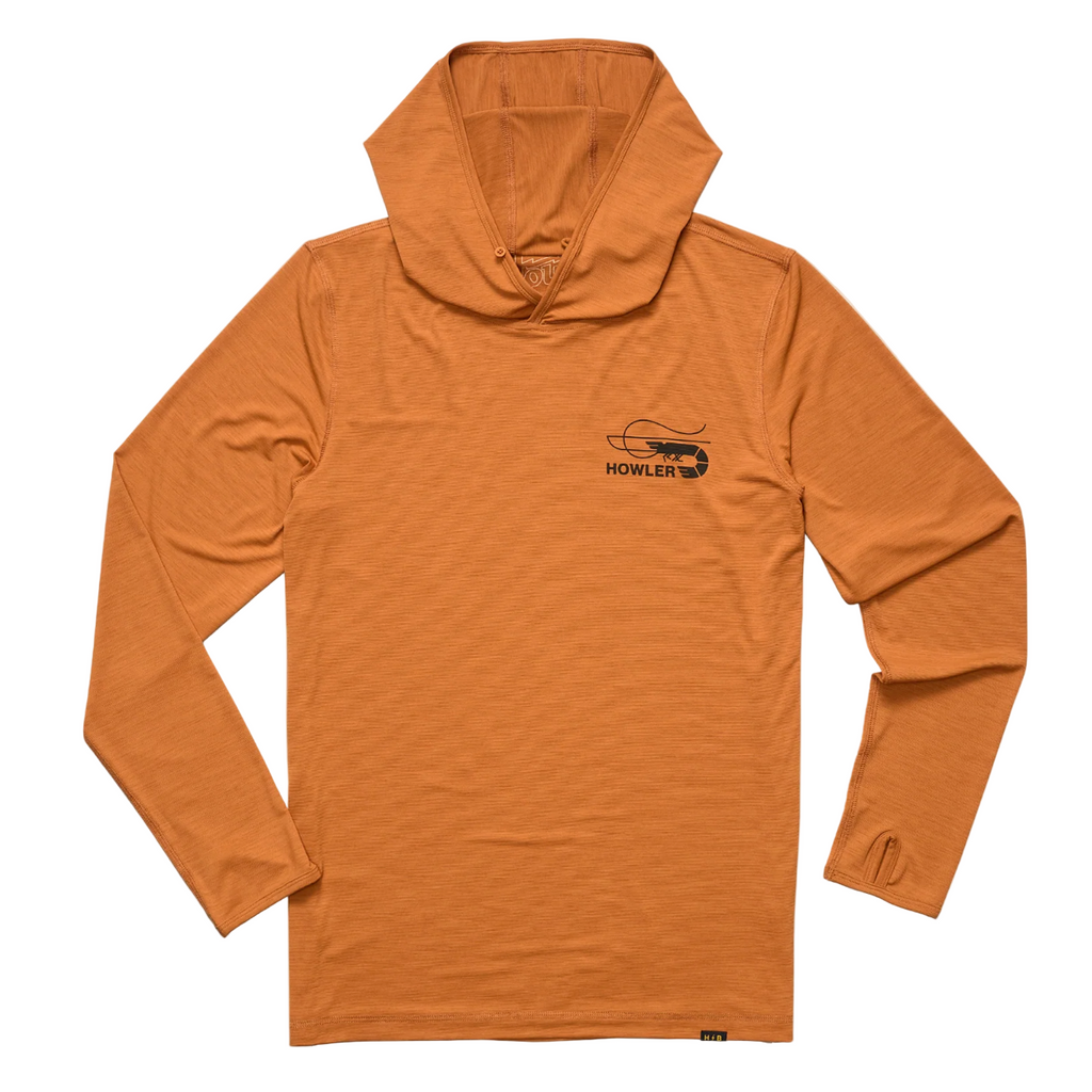 Orange hoodie with a logo on the chest against a beige background