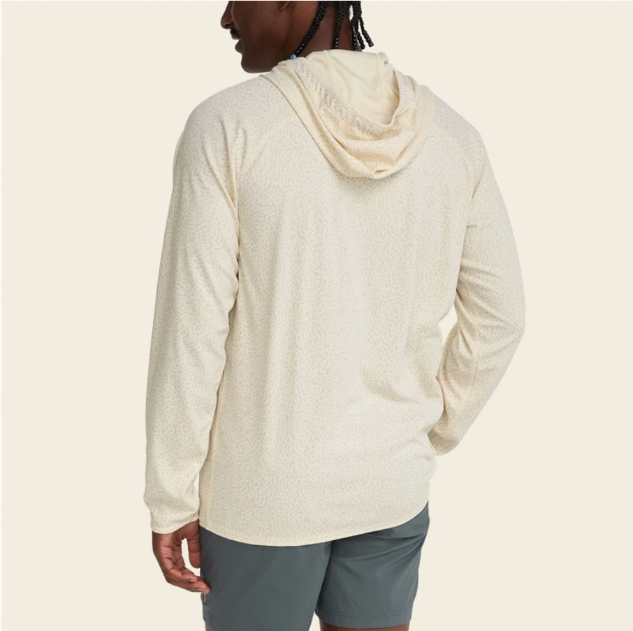 Back of a man wearing a hoodie on a neutral background