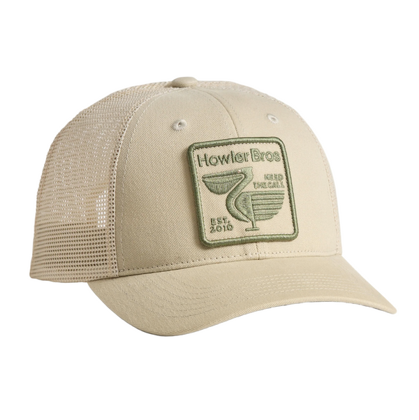 Beige cap with a green logo on a beige background