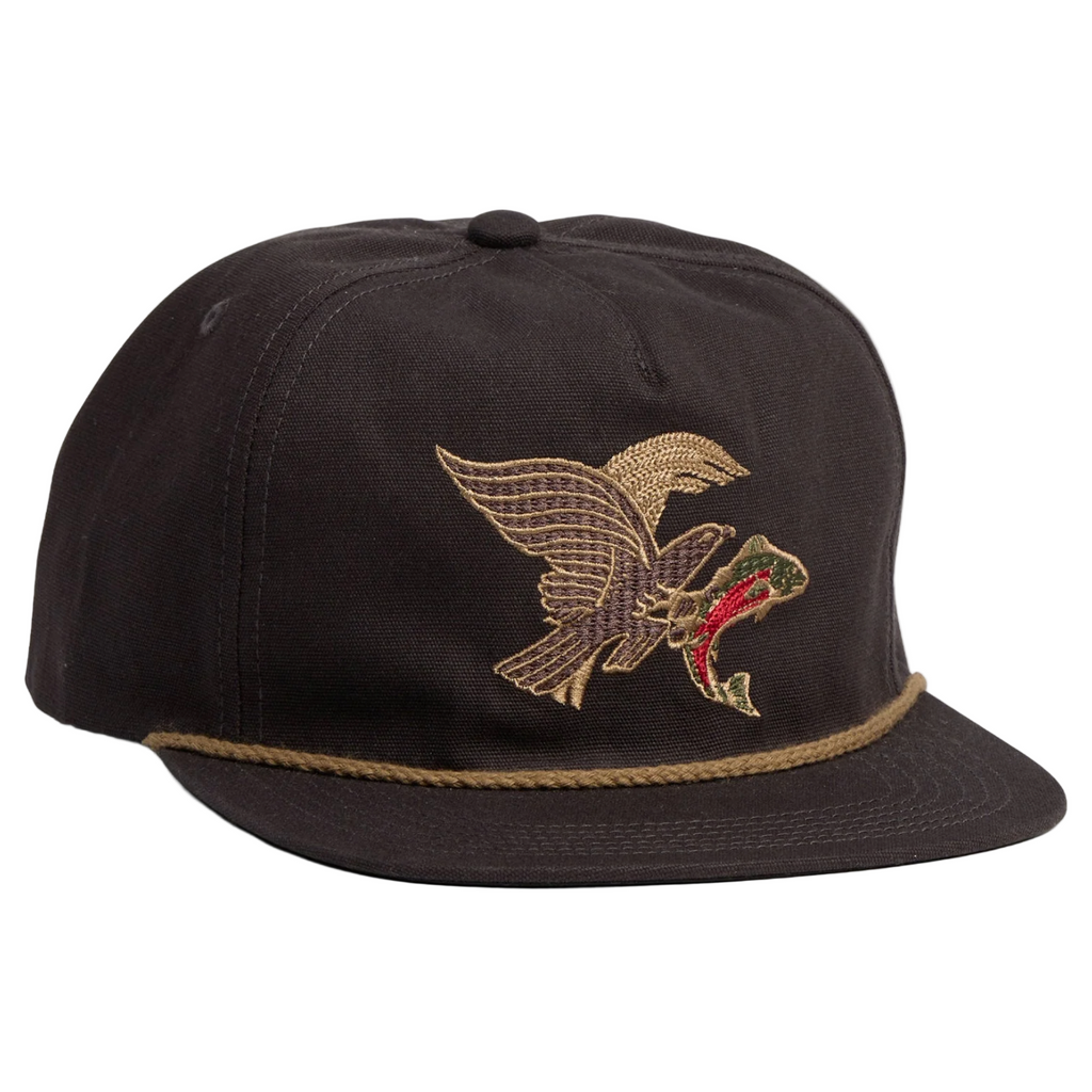 Black cap with embroidered eagle design on a beige background