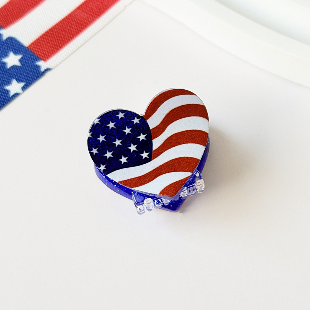 Heart-shaped object with American flag design on a white background