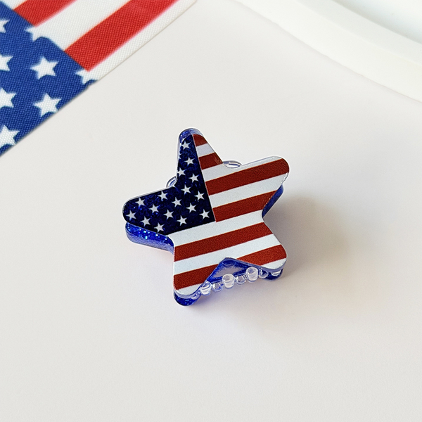 Star-shaped object with American flag design on a white background