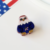 Cartoon-style eagle with an American flag on a white background
