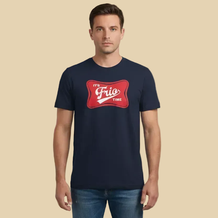 Man wearing a navy blue t-shirt with a red graphic and text on a beige background