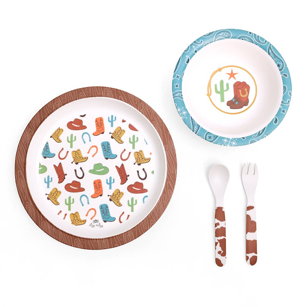 Children's dinnerware set with cowboy-themed plates, cutlery, and a small bowl on a white background.