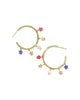 Gold hoop earrings with colorful star charms on a white background