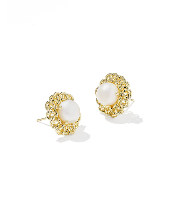 Gold earrings with white gemstones on a white background