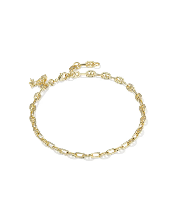 Gold chain bracelet on a white background