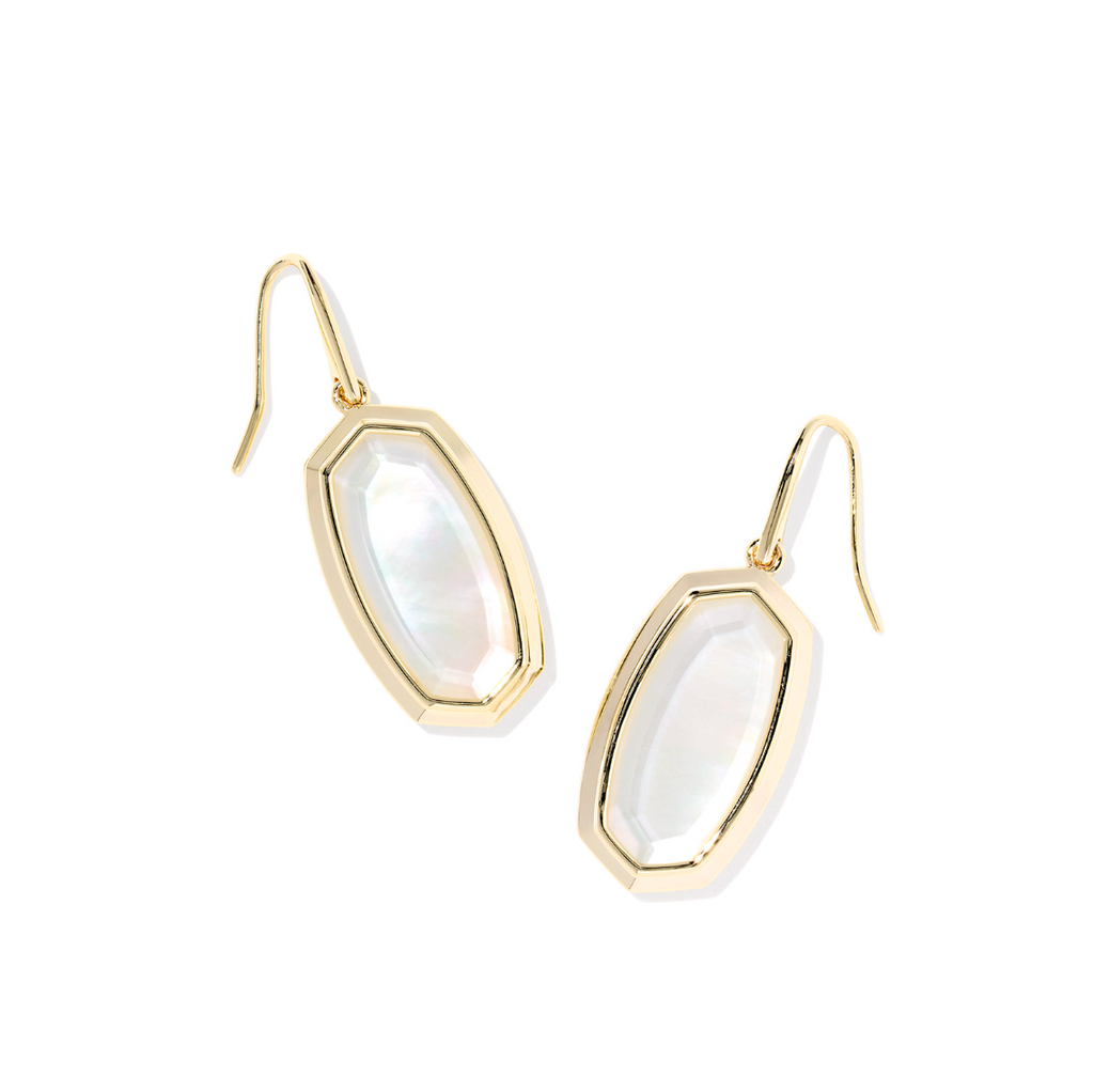 Gold earrings with white gemstones on a white background