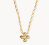 A gold chain necklace featuring a textured, four-petal flower pendant, displayed against a clean white background.