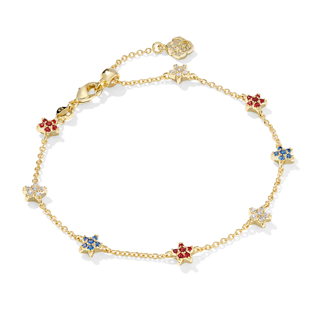 A gold-colored chain bracelet featuring red, white, and blue star-shaped crystals.