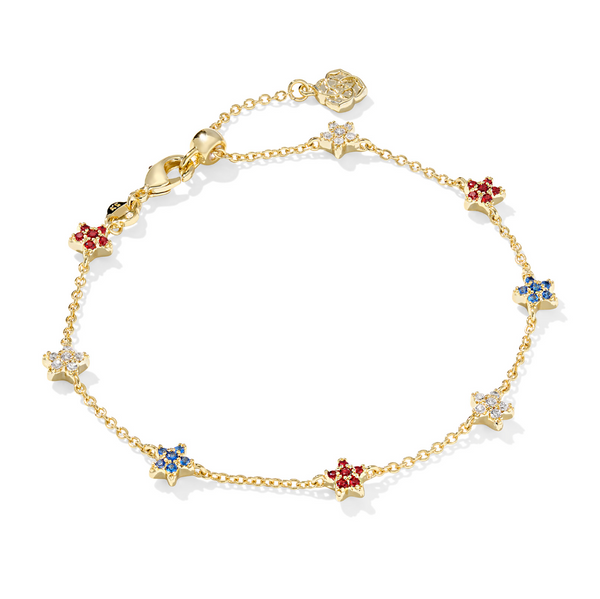 A gold-colored chain bracelet featuring red, white, and blue star-shaped crystals.
