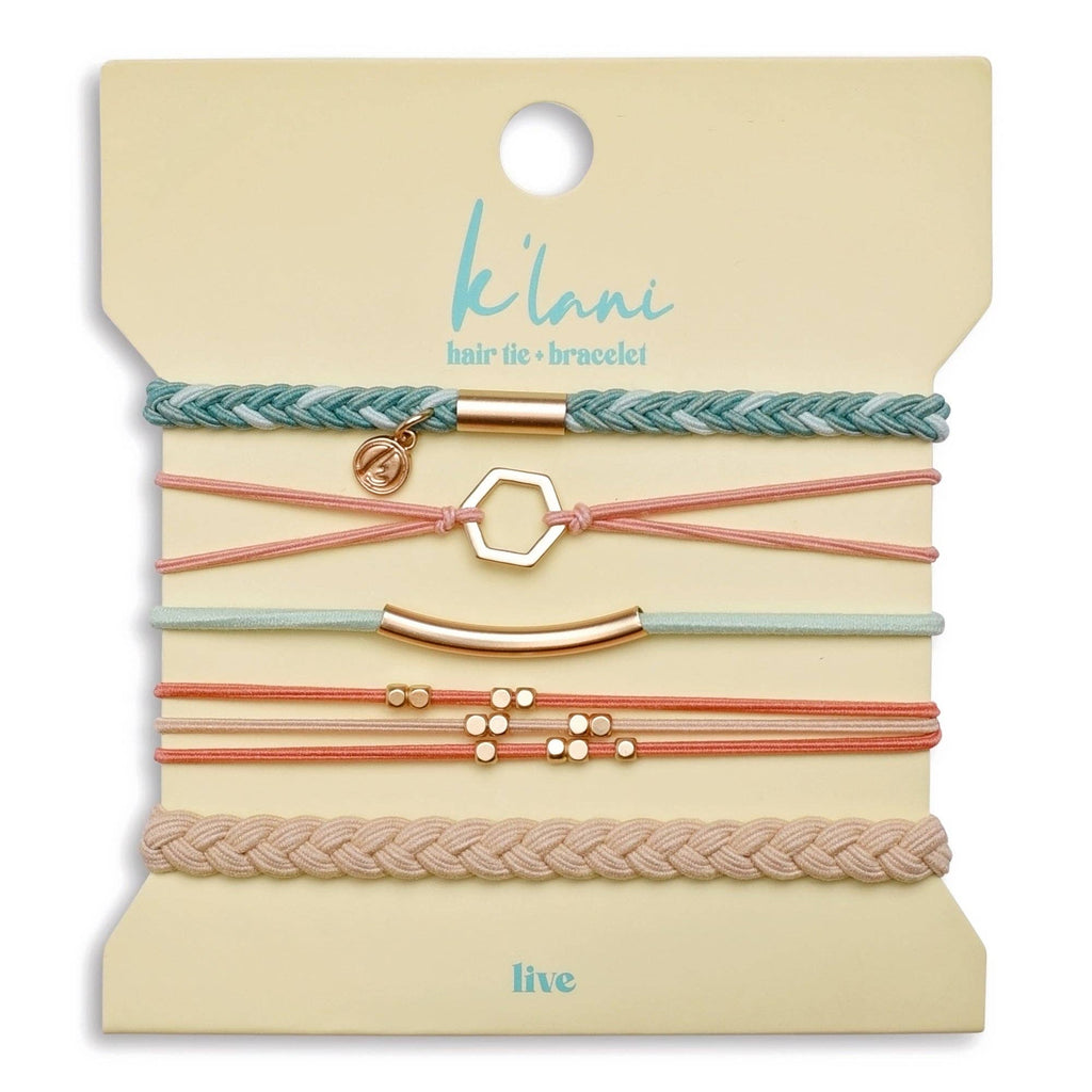 Set of hair ties and bracelets on a 'klari' branded card