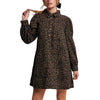 Woman wearing a leopard print dress on a white background