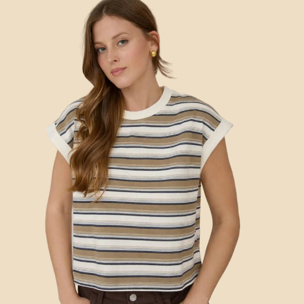 Woman wearing a striped shirt with a neutral background