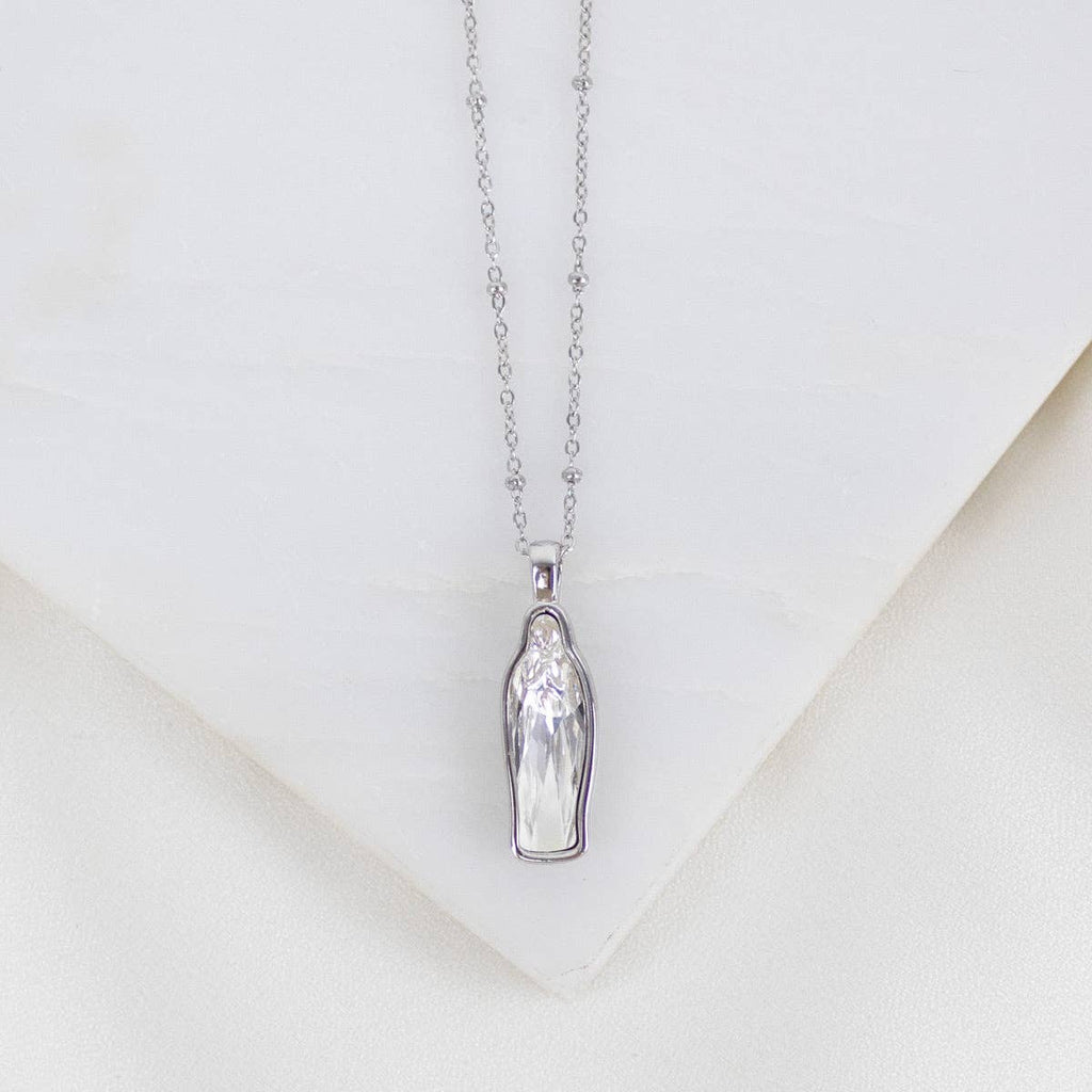 Silver pendant necklace on a white background