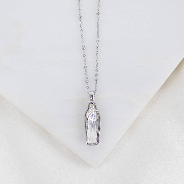 Silver pendant necklace on a white background