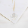 Heart-shaped pendant necklace on a white background