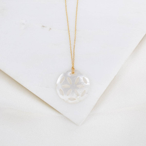 Heart-shaped pendant necklace on a white background