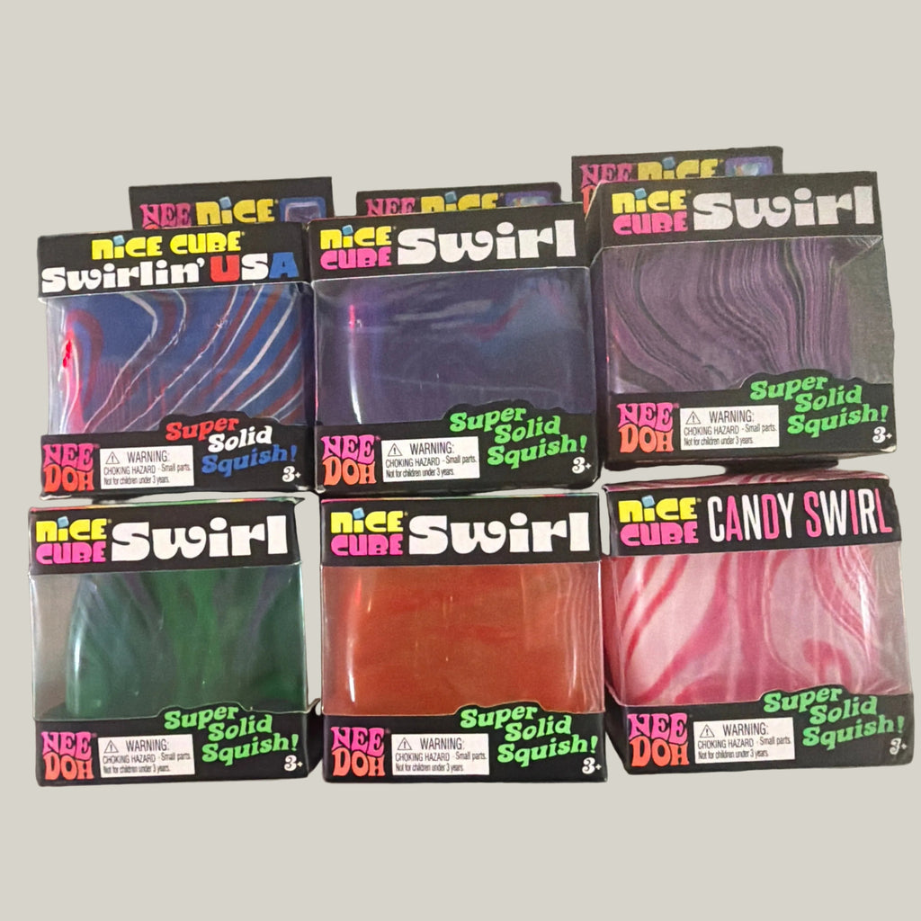 Six boxes of Nee Doh Swirlin' USA candy squishies arranged in two rows on a rustic wooden table. The boxes contain various colorful, swirled gel candies, including purple, green, orange, and pink varieties.