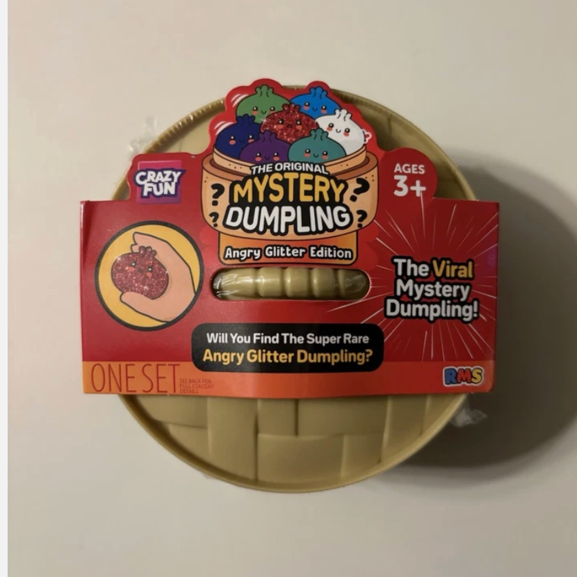 RMS Dumpling in a brown box and a red label